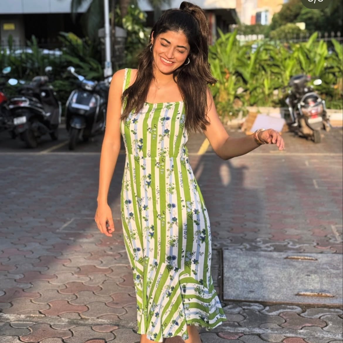 Actress Tasneem khan in khamna Verdant Bloom – Striped Flared Midi Dress looking joyful