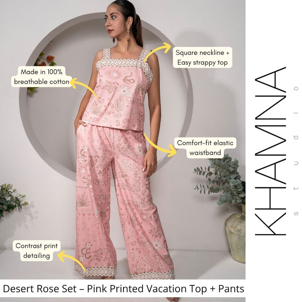 Woman wearing a pink printed vacation top and pants with product features highlighted, set against a white background.