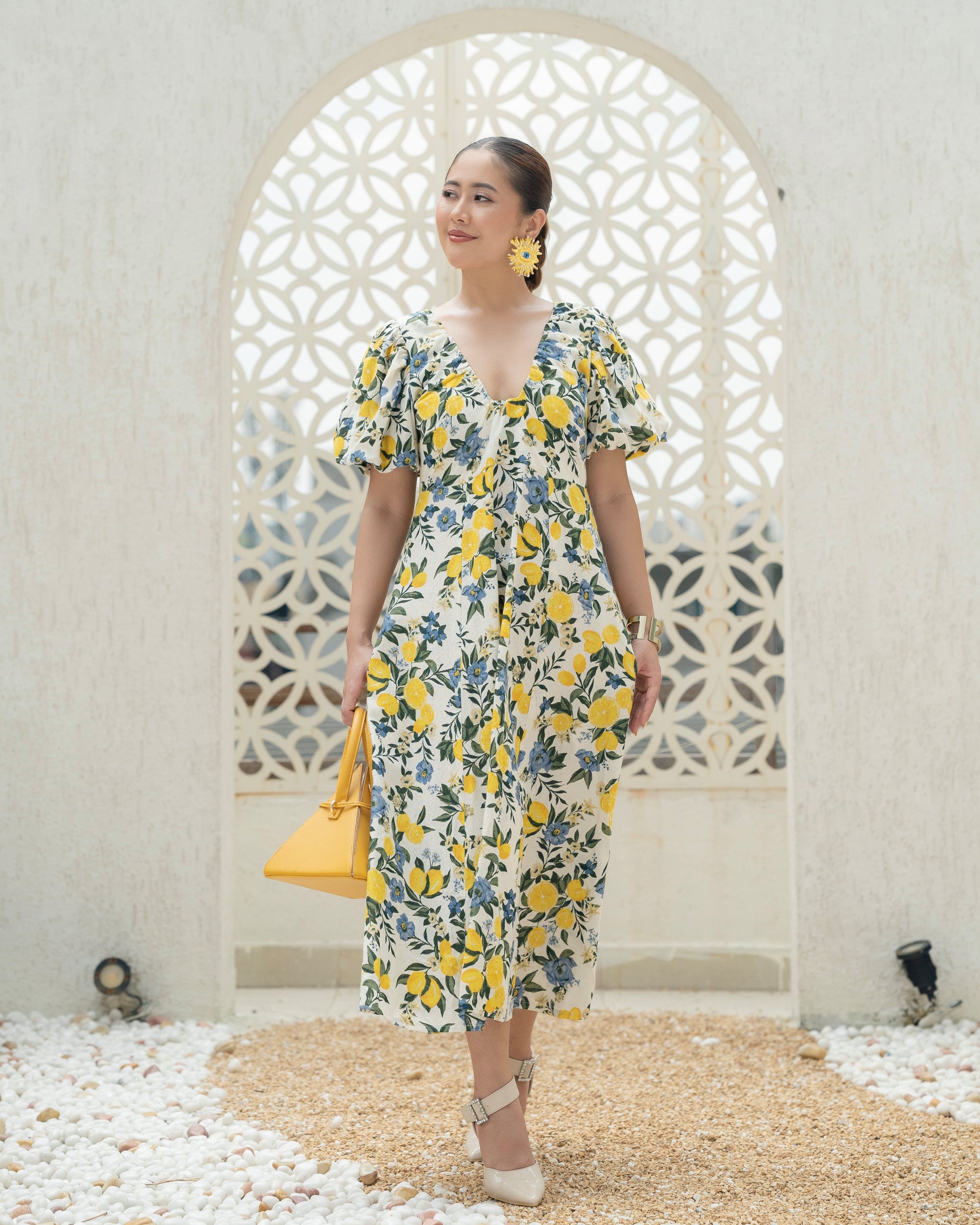Citrus bloom puff sleeve dress from Khamna