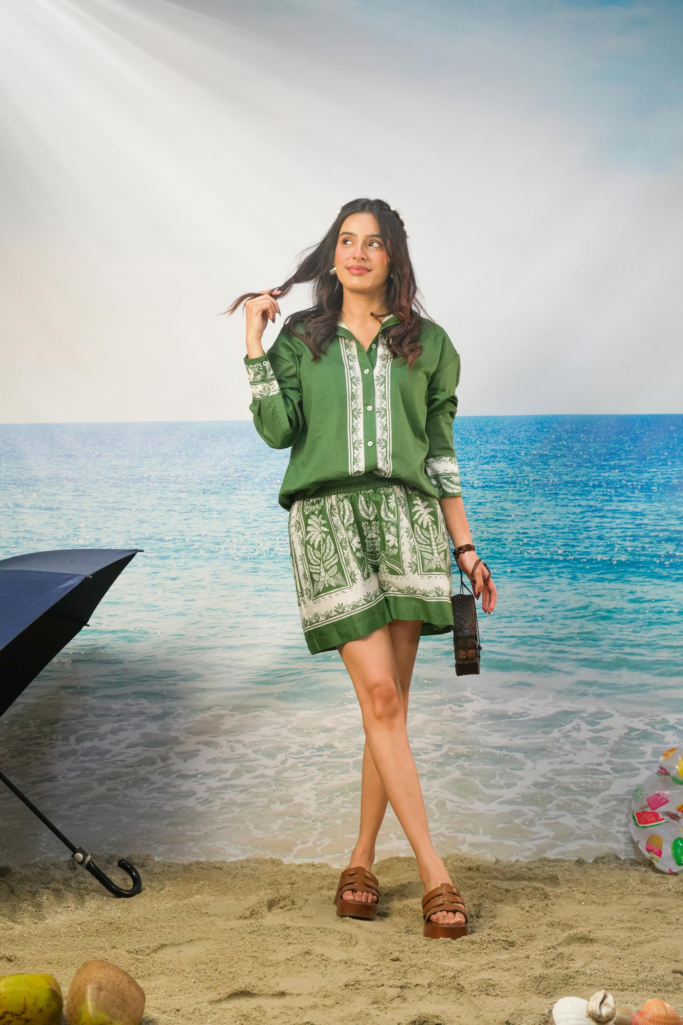 Khamna Yoshita Green Cotton Co-ord Set  Oversized Shirt & Shorts form With Love resort 26 on beach backdrop