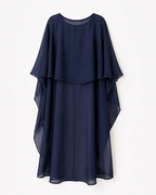 A navy blue sheer overlay dress with a layered, draped design, featuring a round neckline and a flowing silhouette, shown against a plain white background.