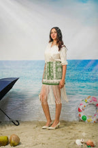Naina Fringe Skirt | Green Botanical Resort Skirt with Fringe Hem