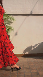 women wearing red layered floral jacquard maxi dress

Señorita red evening dress with cascading layers

festive red maxi dress for Christmas and New Year