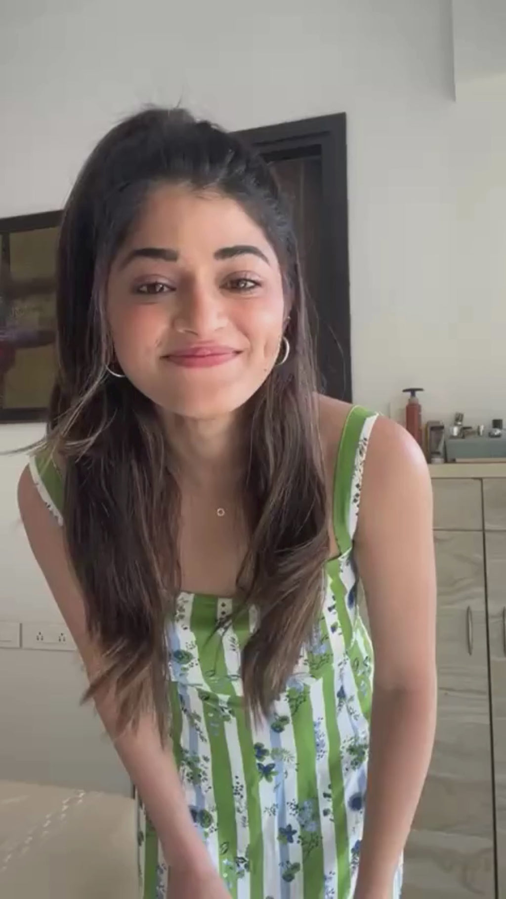 Actress Tasneem khan in Verdant Bloom – Striped Flared Midi Dress 3 twirling around in our mermaid cut dress