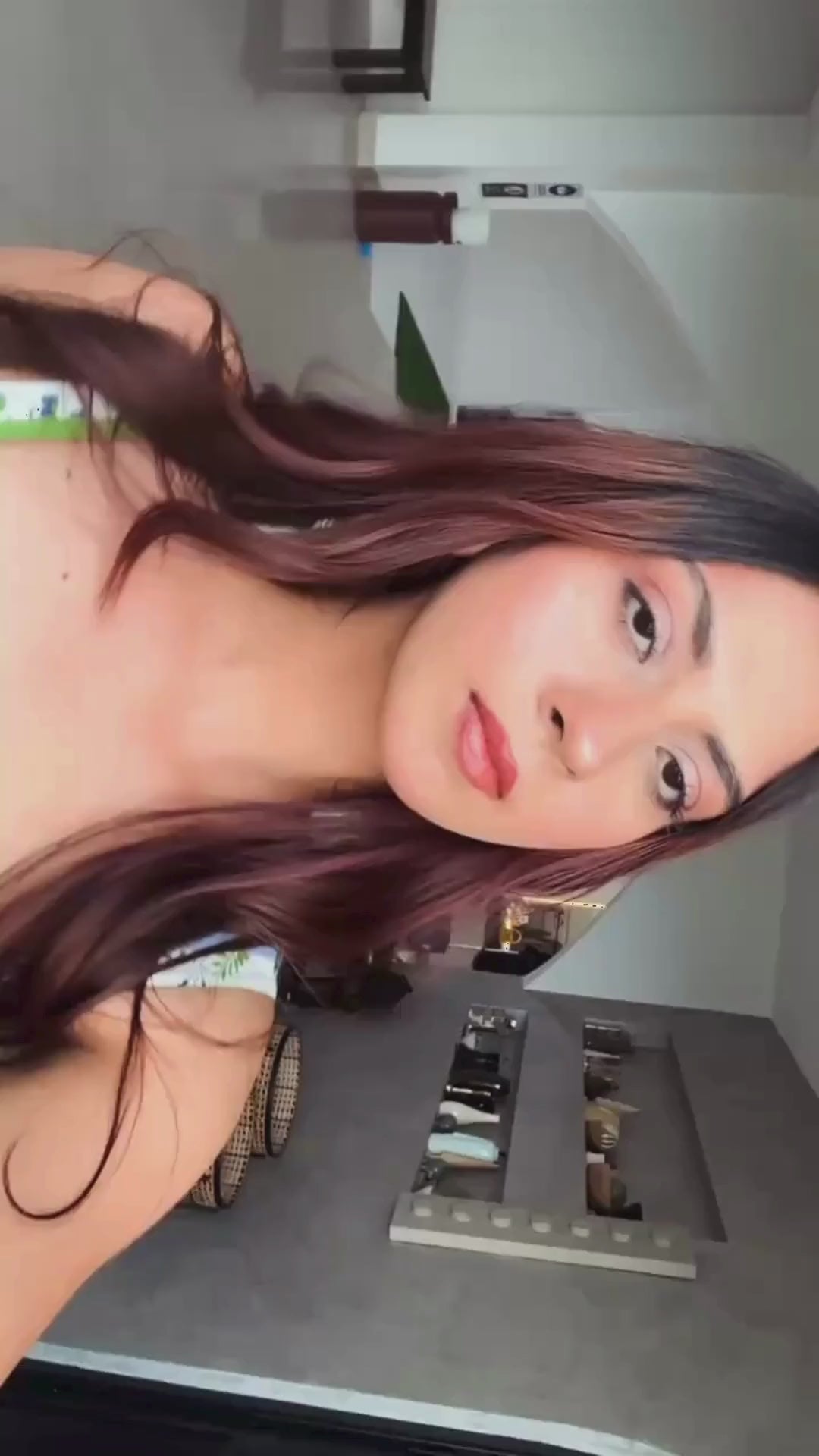 Model in Verdant Bloom – Striped Flared Midi Dress 3 easy flowy dress in rayon with whit and green stripes with blue floral print. 