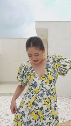 Citrus Bloom Puff Sleeve Dress – Printed Cotton Flax model explaining her happiness that it has pockets. ✔ citrus bloom floral cotton midi dress women
✔ puff sleeve printed summer dress
✔ lemon blue floral vacation dress cotton flax
✔ women’s casual summer midi dress khamna