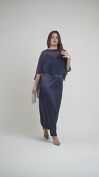 Model Showcasing Nancy cape dress new color of bestseller Nisha Cape dress