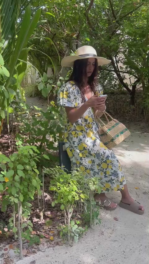 Client video in khamna citrus bloom dress